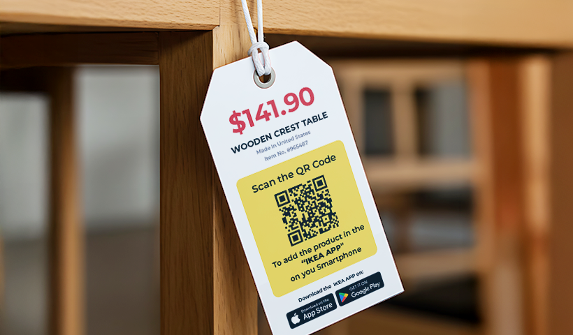 Price tag on a wooden table showing a $141.90 price and a QR code for adding the product in the IKEA app.